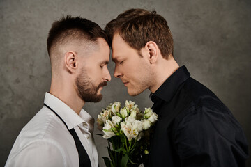 A loving gay couple in dapper suits shares a tender moment.