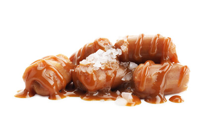 Yummy candies with caramel sauce and sea salt isolated on white