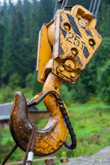 Metal hook of the industrial crane.