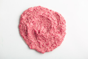 Berry yoghurt ice cream close-up on a white background.. Smoothies from fresh fruits and berries. Ice cream texture. Delicious sweet dessert close-up as a background.