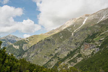 Western Slopes of Koncheto Ridge in Pirin Mountains Under Cumulus Clouds in Early June 