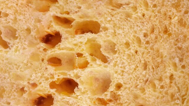 Cake Texture, rotation in circle. the cross section of the Easter cake, Turning. selective focus. Colombo (panettone) cake cross section