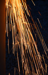 iskry, pomarańczowe iskry, iskry ze szlifierki kątowej podczas cięcia metalu, orange sparks, sparks from the grinder, Sparks from cutting metal of angle grinder, spark from the grinding wheel  © kateej