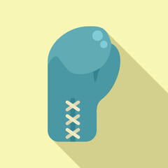 Blue boxing glove with white laces is laying on a yellow background, ready for a sparring match