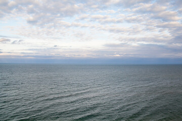 Seascape. Calm sea. Sky and clouds over the sea.