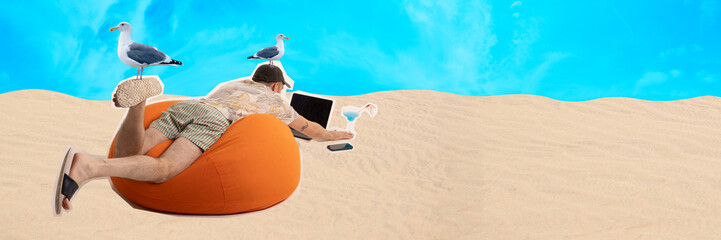 Contemporary art collage. Man sprawls on orange bean bag in sand, working on his laptop with drink...