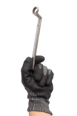 Hand of worker holding a ring spanner isolated on white background. Working glove.