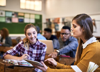 Students, e learning and tablet for university as group in college or school in class for assignment. Teamwork, people and collaboration with reading on tech for exam, project or tutorial for science