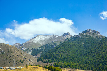 Aba, Sichuan Province - mountains and grasslands under the blue sky