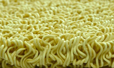 close up of raw dry instant noodles on white background