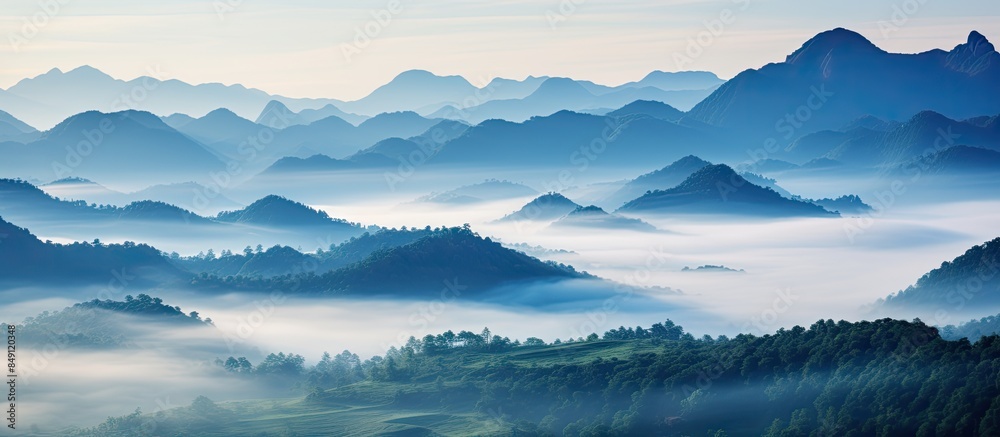 Poster an landscape image of morning before sun rise at valley mountain with the mist. creative banner. cop