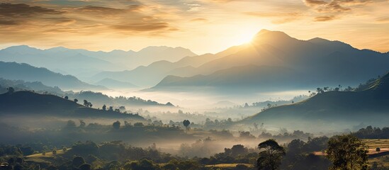 Sunrise projecting silhouette of mountains in rural and wooded area of central america imposing presence of light in summer morning. Creative banner. Copyspace image