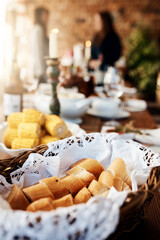 Easter, holiday and bread in basket, celebration and food for festive, healthy and religion in dining room. Closeup, top view and table for Pasqua in Italy, breakfast or meal in morning for ceremony