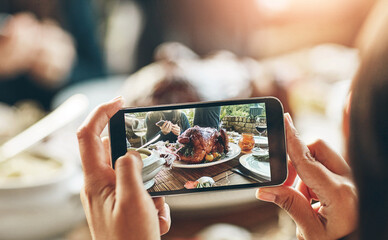 Hands, dinner and food by photography for blog on smartphone, plate of turkey and person vlogging. Table, cellphone and camera for social media post, meat and meal with culinary for review on web app