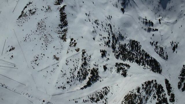 Aerial video over Coll blanc KSB ski resort, Andorra in a snowy winter