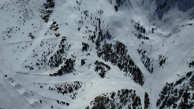 Aerial video over Coll blanc KSB ski resort, Andorra in a snowy winter