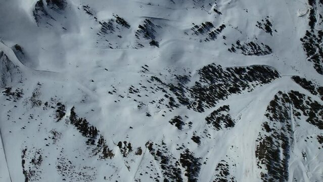 Aerial video over Coll blanc KSB ski resort, Andorra in a snowy winter