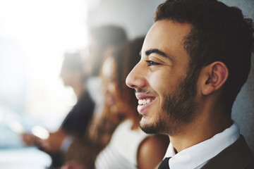 Business, man and profile or happy in office, thinking and smile in interview line up or job opportunity. Confident, recruiting and corporate or people waiting for hr, male applicant and hire process