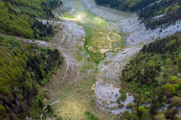 Scenic hiking trails through stone landscapes and dense forests