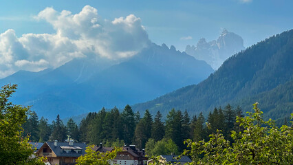 Fototapeta premium italian alps dolomites national park lake mountain trekking peaks tre cime brais lake carezza lake reflection clouds