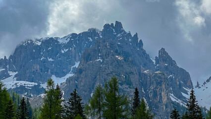 Fototapeta premium italian alps dolomites national park lake mountain trekking peaks tre cime brais lake carezza lake reflection clouds
