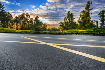 Fototapeta premium sunset forest road landscape outdoor