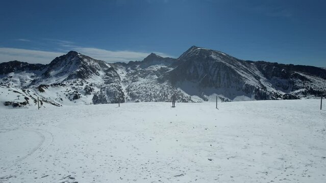 Aerial video over Coll blanc KSB ski resort, Andorra in a snowy winter