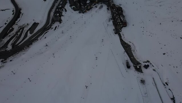 Aerial video over Coll blanc KSB ski resort, Andorra in a snowy winter