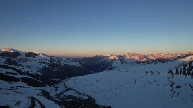 Aerial video over Coll blanc KSB ski resort, Andorra in a snowy winter