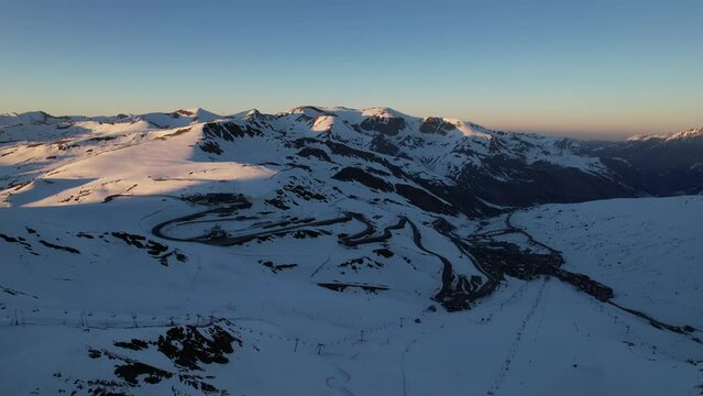 Aerial video over Coll blanc KSB ski resort, Andorra in a snowy winter