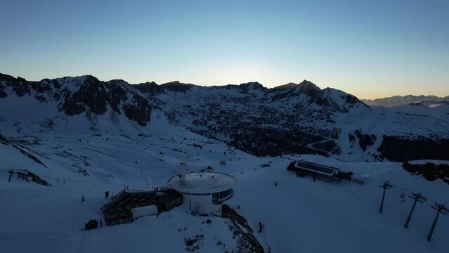Aerial video over Coll blanc KSB ski resort, Andorra in a snowy winter