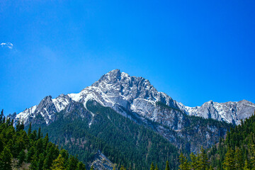 Jiuzhaigou, Aba, Sichuan Province - lakes and mountains under the blue sky
