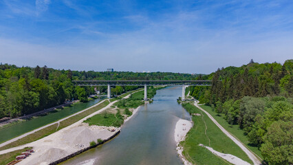 Aerial drone footage of railway bridge over the Isar river in Munich