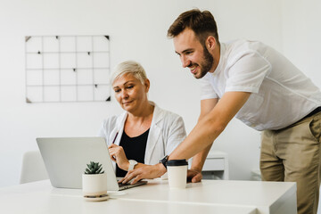 Diverse business team having a meeting in a creative workplace
