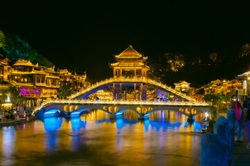 Obraz premium Phoenix Ancient Town, Xiangxi, Hunan Province - panoramic night view of the city scenery