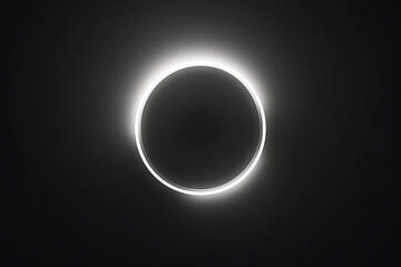 Black background with a glowing white circle in the center.
