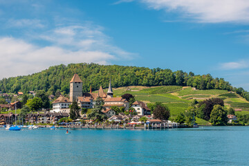 Naklejka premium Spiez castle on the lake Thun, Switzerland.