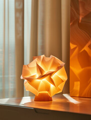 Abstract paper lamp on a table, softly illuminated.