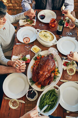 Family, praying and food for thanksgiving, dinner and celebration outdoor with turkey, wine or...