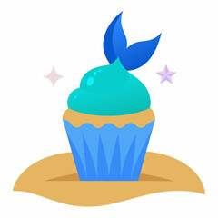 A cupcake with sparkling blue frosting and a mermaid tail topper rests on a sandy beach