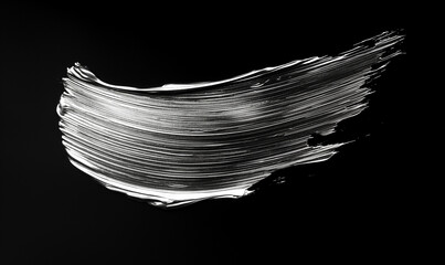 Fototapeta premium A single clipart depicting soft, metallic silver brush strokes on a black background in the style of a metallic silver glitter texture. 