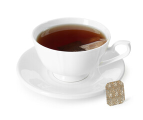 Brewing aromatic tea. Cup with teabag isolated on white