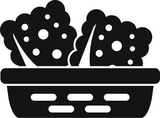 Black and white icon of freshly baked cookies cooling in a basket, perfect for representing baking and desserts