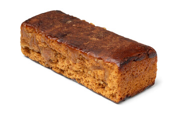 Single traditional Dutch ginger breakfast cake isolated on white background close up
