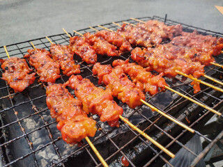 Grilled chicken, street food in Thailand
