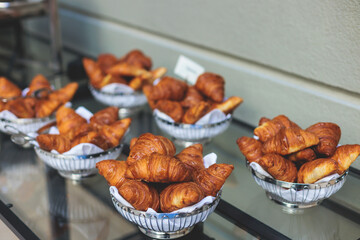Set of coffee break lunch in the hotel restaurant during conference meeting, with tea and coffee catering, decorated banquet table with white tableware and metal tea maker machine boiler