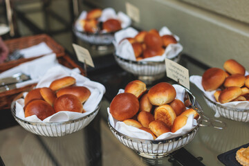 Beautifully decorated luxury banquet catering table, with variety of with different food snacks appetizers on corporate birthday party event wedding celebration, canape, salad, delicatessen variety