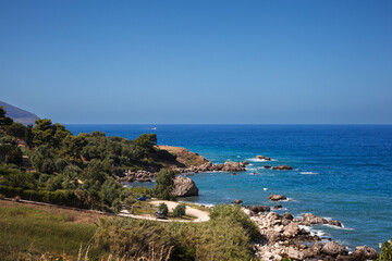 Fototapeta premium Paradise sea panorama from coastline trail of Scopello, Italy