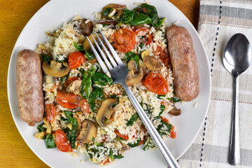 rice with spinach, tomatoes and mushrooms