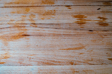 Background: Light wood texture with a natural pattern.